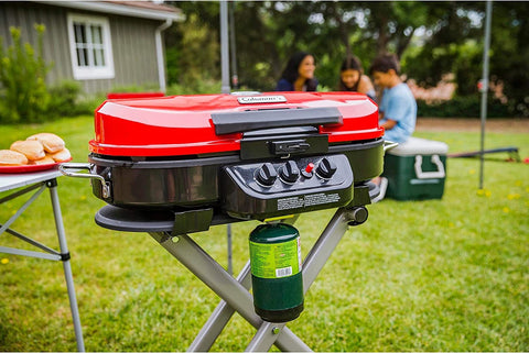 Image of Coleman Roadtrip 285 Portable Stand-Up Propane Grill, Gas Grill with 3 Adjustable Burners & Instastart Push-Button Ignition; Great for Camping, Tailgating, BBQ, Parties, Backyard, Patio & More