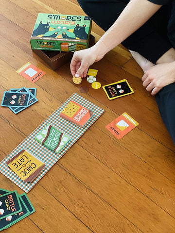 Image of Chronicle Books S’Mores Wars: the Campfire Card Game of Snack Attacks (Competitive Card-Drafting Marshmallow Game for the Whole Family, Fast & Fun Food-Themed Card Game),Multicolor