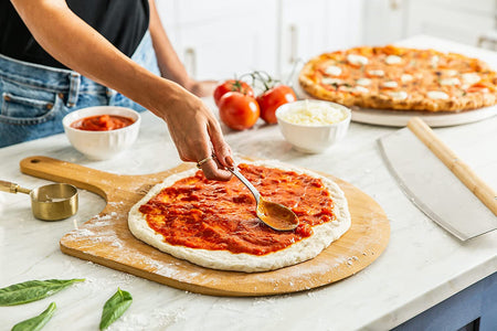 4-Piece Large Pizza Stone Set - 13" Thermal Shock Resistant Cordierite Pizza Stone with Handle Rack, 19" Natural Bamboo Pizza Peel & Pizza Cutter - Large Baking Stone for Grill and Oven
